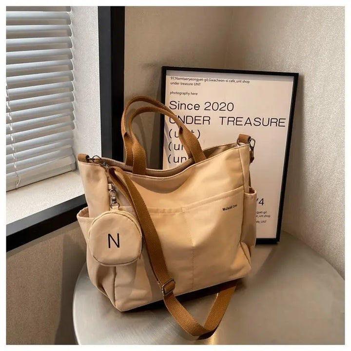 Bolsa mensageiro à prova d'água feminina, bolsa de ombro de nylon para estudantes