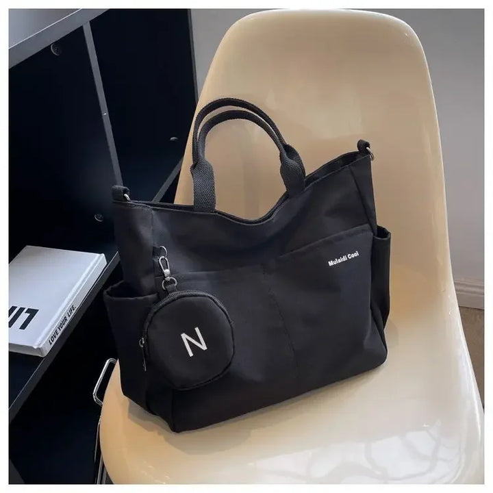 Bolsa mensageiro à prova d'água feminina, bolsa de ombro de nylon para estudantes