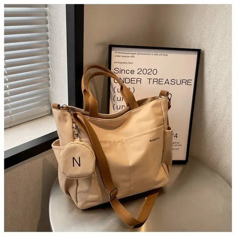 Bolsa mensageiro à prova d'água feminina, bolsa de ombro de nylon para estudantes