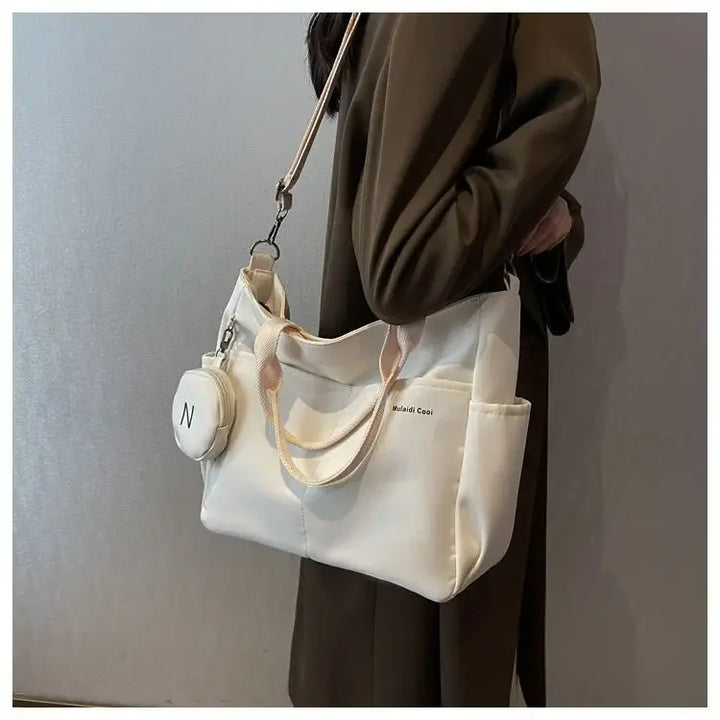 Bolsa mensageiro à prova d'água feminina, bolsa de ombro de nylon para estudantes
