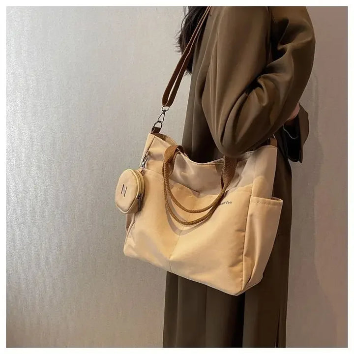 Bolsa mensageiro à prova d'água feminina, bolsa de ombro de nylon para estudantes