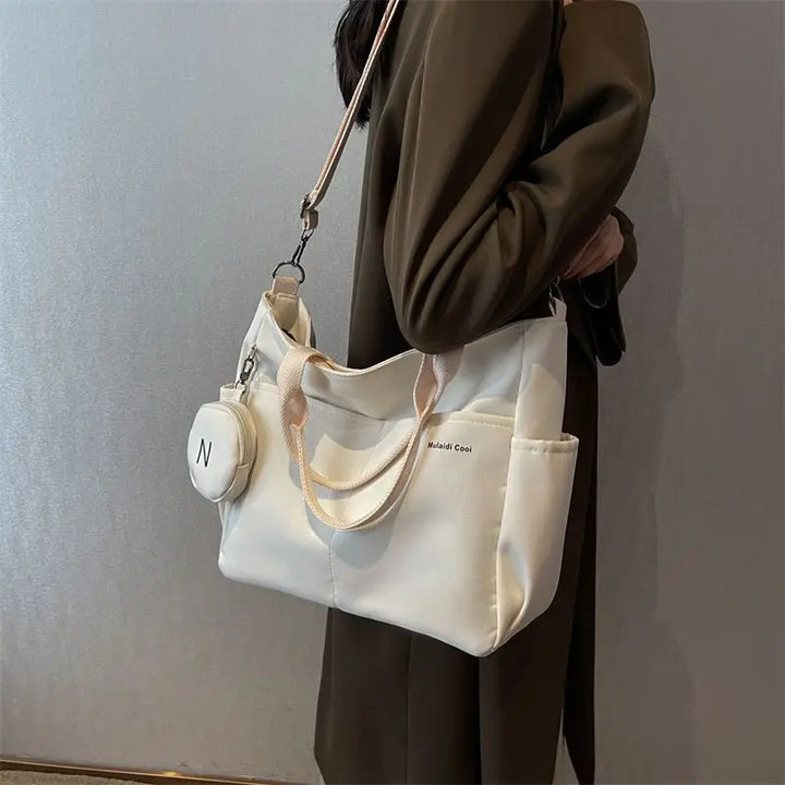 Bolsa mensageiro à prova d'água feminina, bolsa de ombro de nylon para estudantes