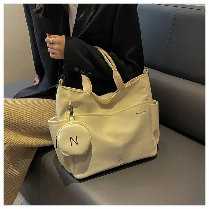Bolsa mensageiro à prova d'água feminina, bolsa de ombro de nylon para estudantes
