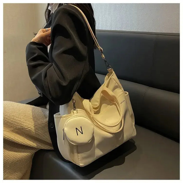 Bolsa mensageiro à prova d'água feminina, bolsa de ombro de nylon para estudantes
